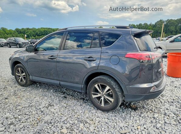 JTMWFREV9HD094689 2017 TOYOTA RAV4 Gray Rear left