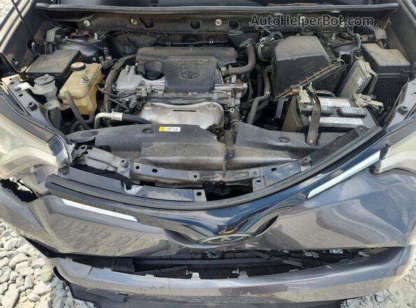 JTMWFREV9HD094689 2017 TOYOTA RAV4 Gray Rear interior view