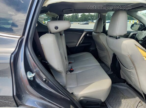 JTMWFREV9HD094689 2017 TOYOTA RAV4 Gray Rear seats view