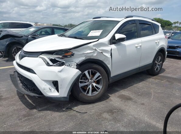 JTMWFREV9HJ102338 2017 TOYOTA RAV4 White Vista tres cuartos delantera izquierda