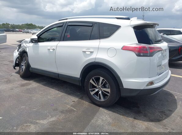 JTMWFREV9HJ102338 2017 TOYOTA RAV4 White Trasero izquierdo