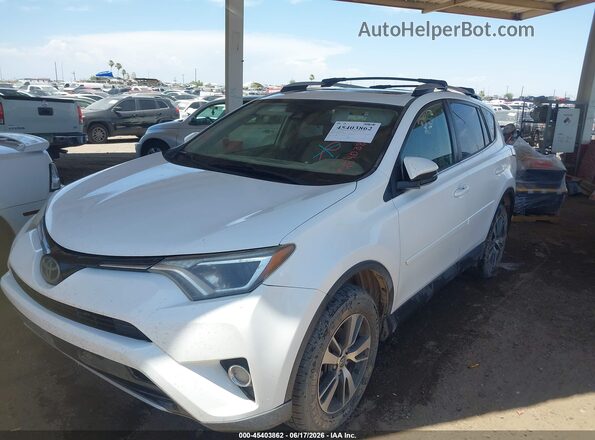 JTMWFREV9HJ141060 2017 TOYOTA RAV4 White Vista tres cuartos delantera izquierda