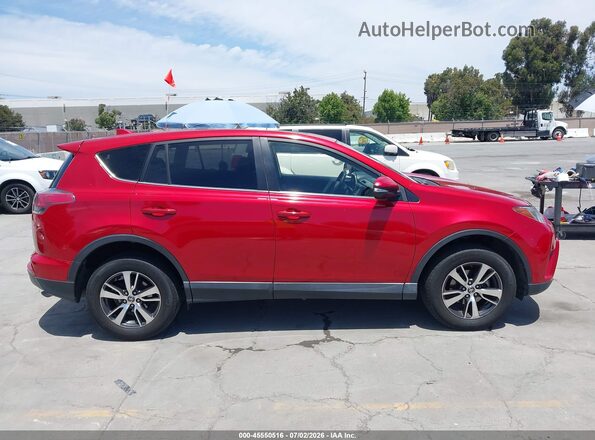 JTMWFREV9HJ146680 2017 TOYOTA RAV4 Red Սալոնի հետևի տեսք