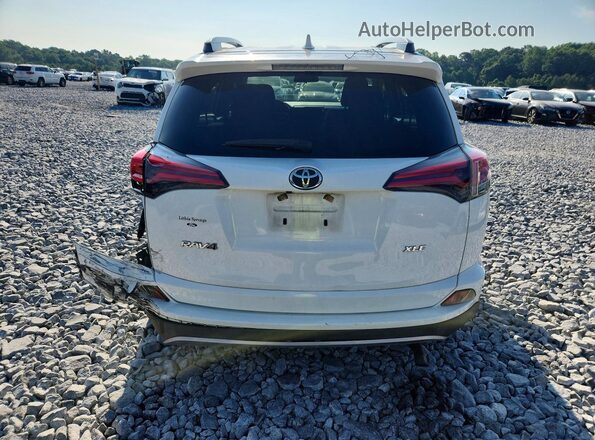 JTMWFREV9JJ174727 2018 TOYOTA RAV4 White Widok z tyłu