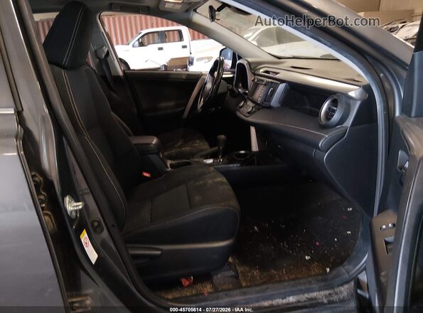 JTMWFREV9JJ190975 2018 TOYOTA RAV4 Gray წინა სალონის ხედი