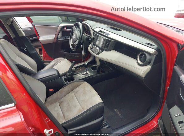 JTMWFREVXHJ108858 2017 TOYOTA RAV4 Red წინა სალონის ხედი