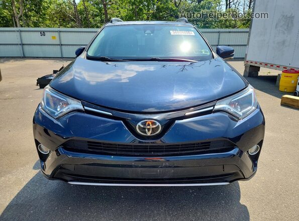 JTMWFREVXHJ142430 2017 TOYOTA RAV4 Black Front view