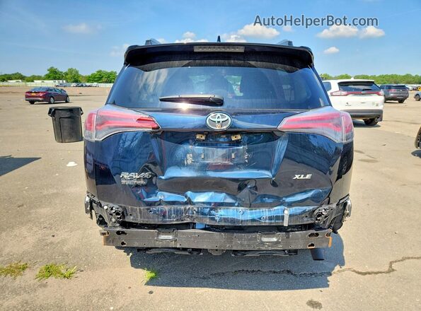 JTMWFREVXHJ142430 2017 TOYOTA RAV4 Black Rear view