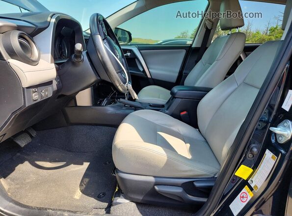 JTMWFREVXHJ142430 2017 TOYOTA RAV4 Black Front interior view