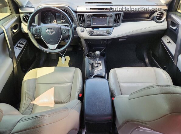 JTMWFREVXHJ142430 2017 TOYOTA RAV4 Black Dashboard view