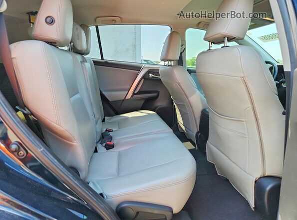JTMWFREVXHJ142430 2017 TOYOTA RAV4 Black Rear interior view