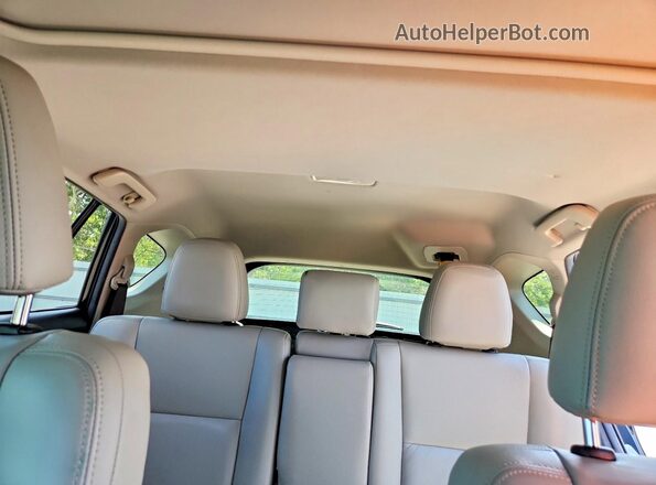 JTMWFREVXHJ142430 2017 TOYOTA RAV4 Black Rear seats view