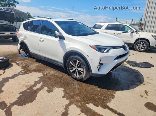 JTMWFREVXHJ718551 2017 TOYOTA RAV4 White Front right