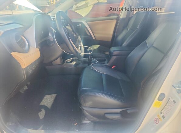 JTMWFREVXHJ718551 2017 TOYOTA RAV4 White Front interior view