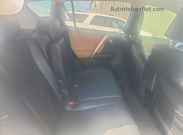 JTMWFREVXHJ718551 2017 TOYOTA RAV4 White Rear interior view