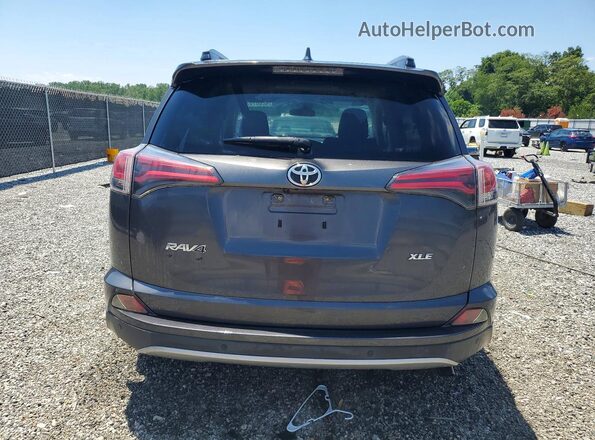 JTMWFREVXJJ168192 2018 TOYOTA RAV4 Gray Vista trasera