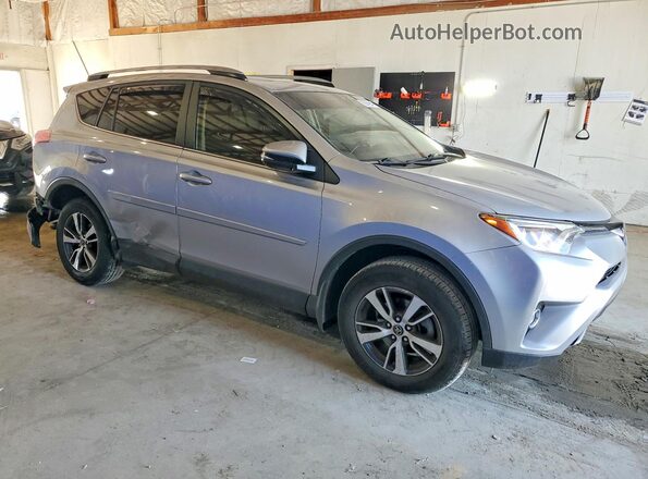 JTMWFREVXJJ194968 2018 TOYOTA RAV4 Silver Przód prawy