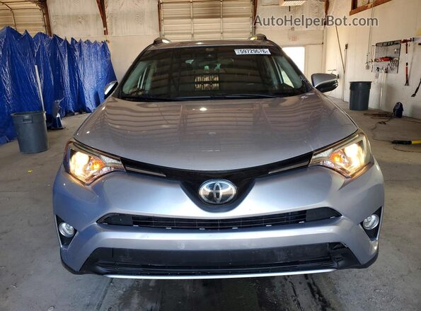 JTMWFREVXJJ194968 2018 TOYOTA RAV4 Silver Widok z przodu