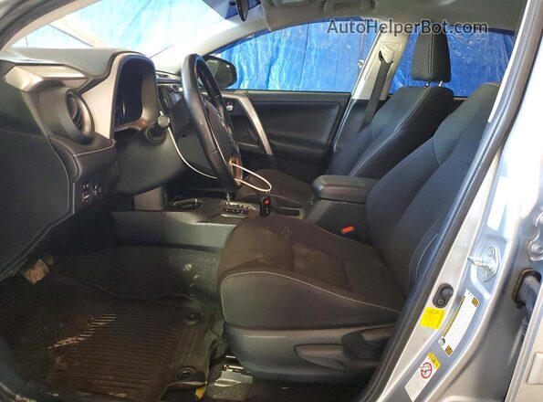 JTMWFREVXJJ194968 2018 TOYOTA RAV4 Silver Widok wnętrza z przodu