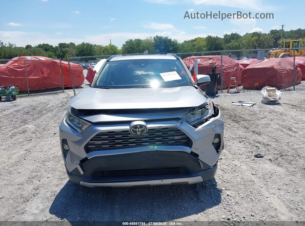 JTMY1RFV0KD008960 2019 TOYOTA RAV4 Silver Vista interior trasera