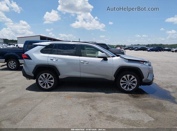 JTMY1RFV0MD071592 2021 TOYOTA RAV4 Silver Rear interior view
