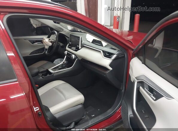 JTMY1RFV7MD070584 2021 TOYOTA RAV4 Red წინა სალონის ხედი