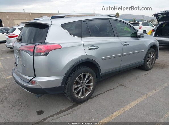 JTMYFREV2JJ180782 2018 TOYOTA RAV4 Silver Rear right
