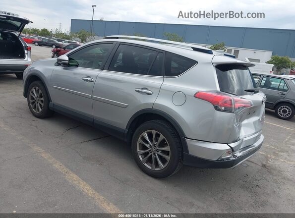 JTMYFREV2JJ180782 2018 TOYOTA RAV4 Silver Rear left