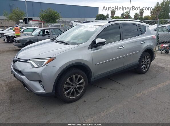 JTMYFREV2JJ180782 2018 TOYOTA RAV4 Silver Front left