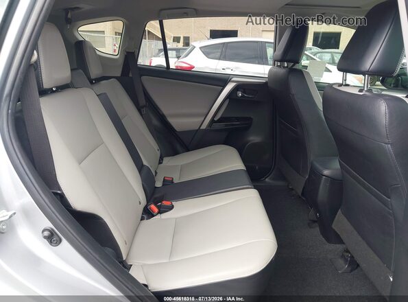 JTMYFREV2JJ180782 2018 TOYOTA RAV4 Silver VIN sticker view