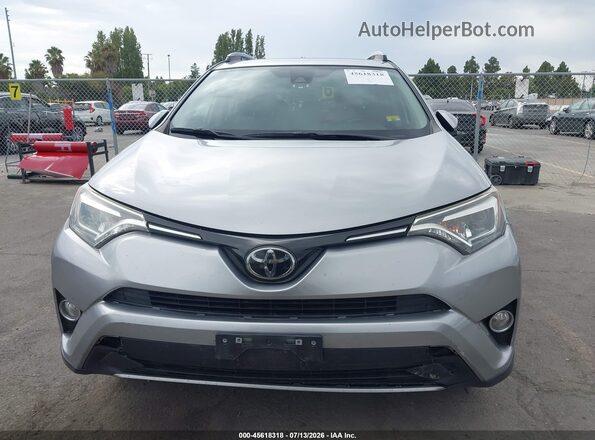 JTMYFREV2JJ180782 2018 TOYOTA RAV4 Silver Instrument cluster view