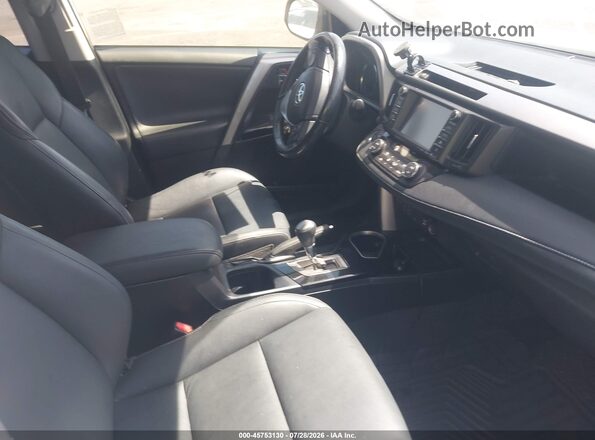 JTMYFREV3GJ099511 2016 TOYOTA RAV4 Белый Вид салона спереди