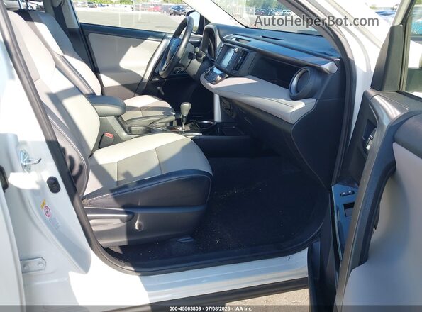 JTMYFREV5GD089044 2016 TOYOTA RAV4 White Widok wnętrza z przodu