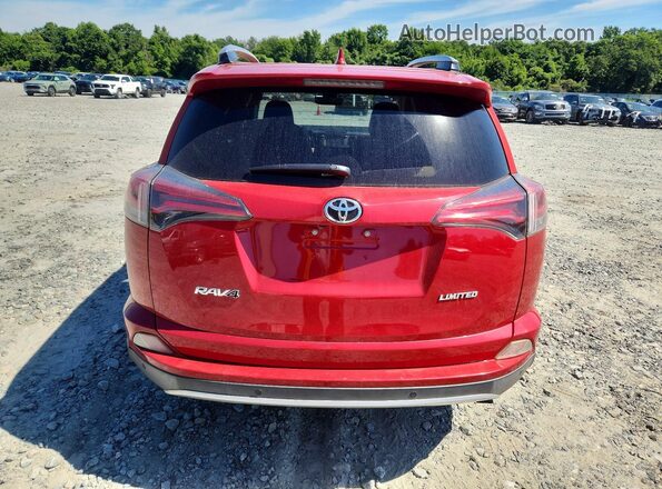 JTMYFREV5GJ069958 2016 TOYOTA RAV4 Red Vista trasera
