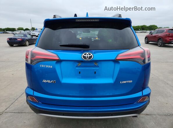 JTMYFREV5HJ709930 2017 TOYOTA RAV4 Blue Rear view