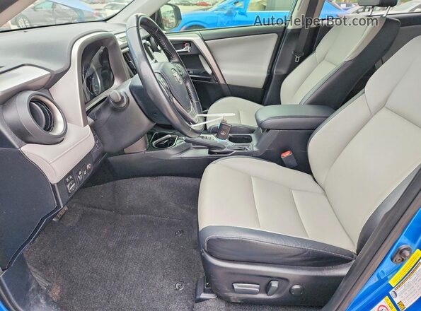 JTMYFREV5HJ709930 2017 TOYOTA RAV4 Blue Front interior view