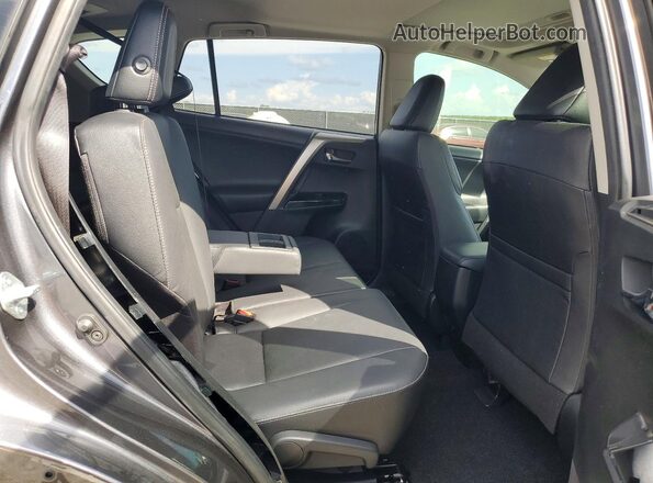 JTMYFREV6JD126934 2018 TOYOTA RAV4 Gray Widok tylnych siedzeń