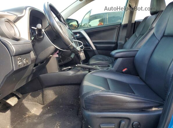 JTMYFREV7JD130393 2018 TOYOTA RAV4 Blue Widok wnętrza z przodu