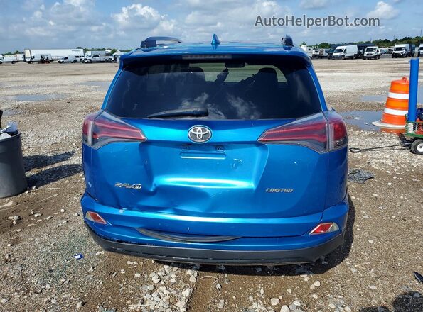 JTMYFREV7JD130393 2018 TOYOTA RAV4 Blue Widok z tyłu