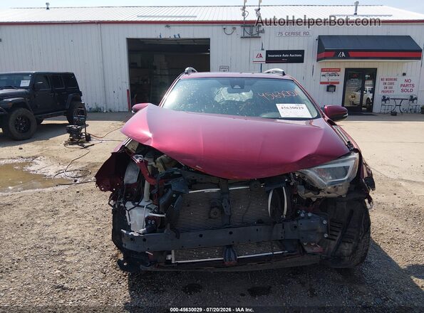 JTMYFREV8JD121038 2018 TOYOTA RAV4 Красный Вид задней части салона