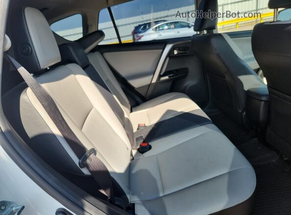 JTMYFREV8JJ198588 2018 TOYOTA RAV4 White უკანა სალონის ხედი
