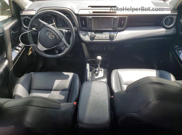 JTMYFREV8JJ734665 2018 TOYOTA RAV4 White Dashboard view