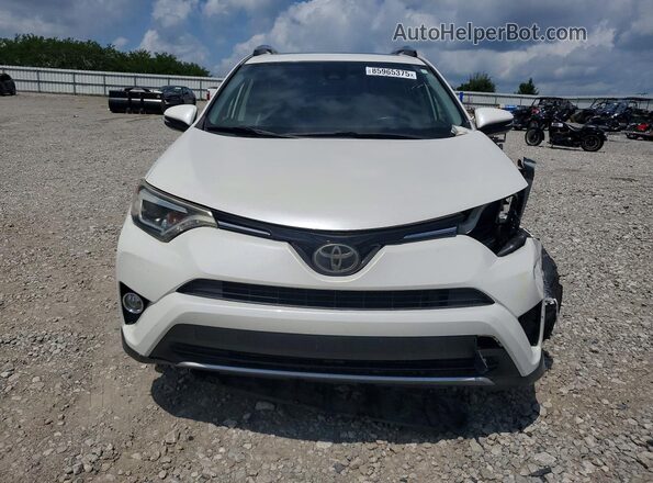 JTMYFREV8JJ734665 2018 TOYOTA RAV4 White Front view