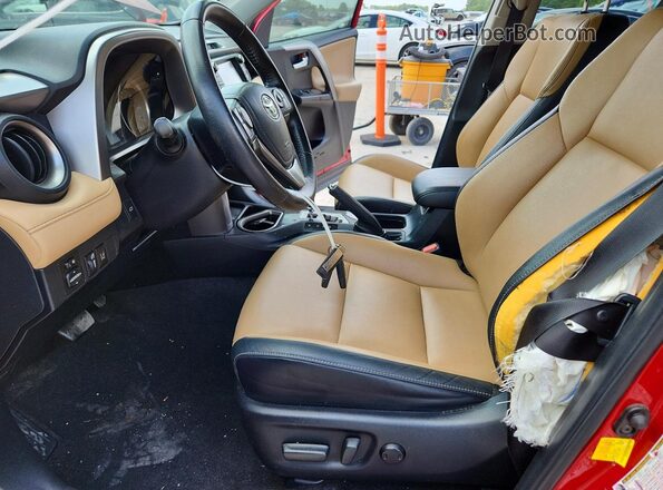 JTMYFREV9GJ082499 2016 TOYOTA RAV4 Red Вид салону спереду