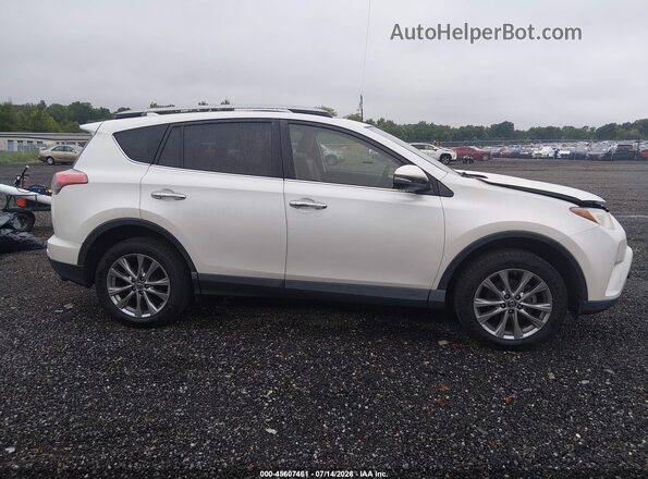 JTMYFREV9HD094166 2017 TOYOTA RAV4 White Rear interior view