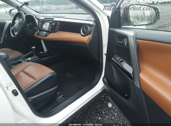 JTMYFREV9HD094166 2017 TOYOTA RAV4 White Front interior view