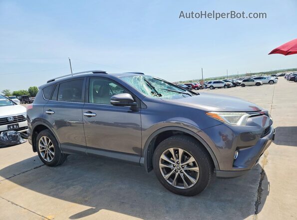 JTMYFREV9HJ131461 2017 TOYOTA RAV4 Gray Delantero derecho