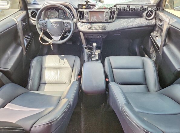 JTMYFREV9HJ131461 2017 TOYOTA RAV4 Gray Vista del salpicadero