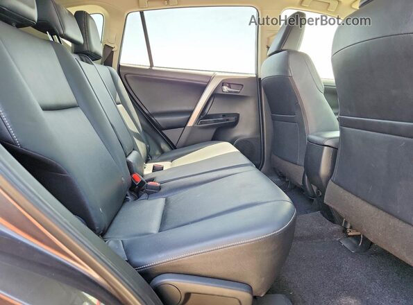 JTMYFREV9HJ131461 2017 TOYOTA RAV4 Gray Vista interior trasera