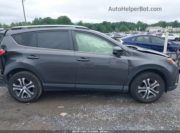 JTMZFREV0JJ154590 2018 TOYOTA RAV4 Серый Вид задней части салона